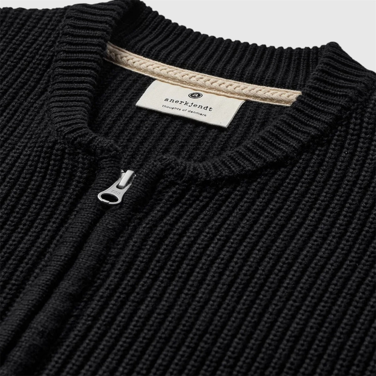 MAGLIONE CON ZIP ANERKJENDT
